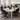 Office Chairs surrounding a desk in a collaborative open office environment 